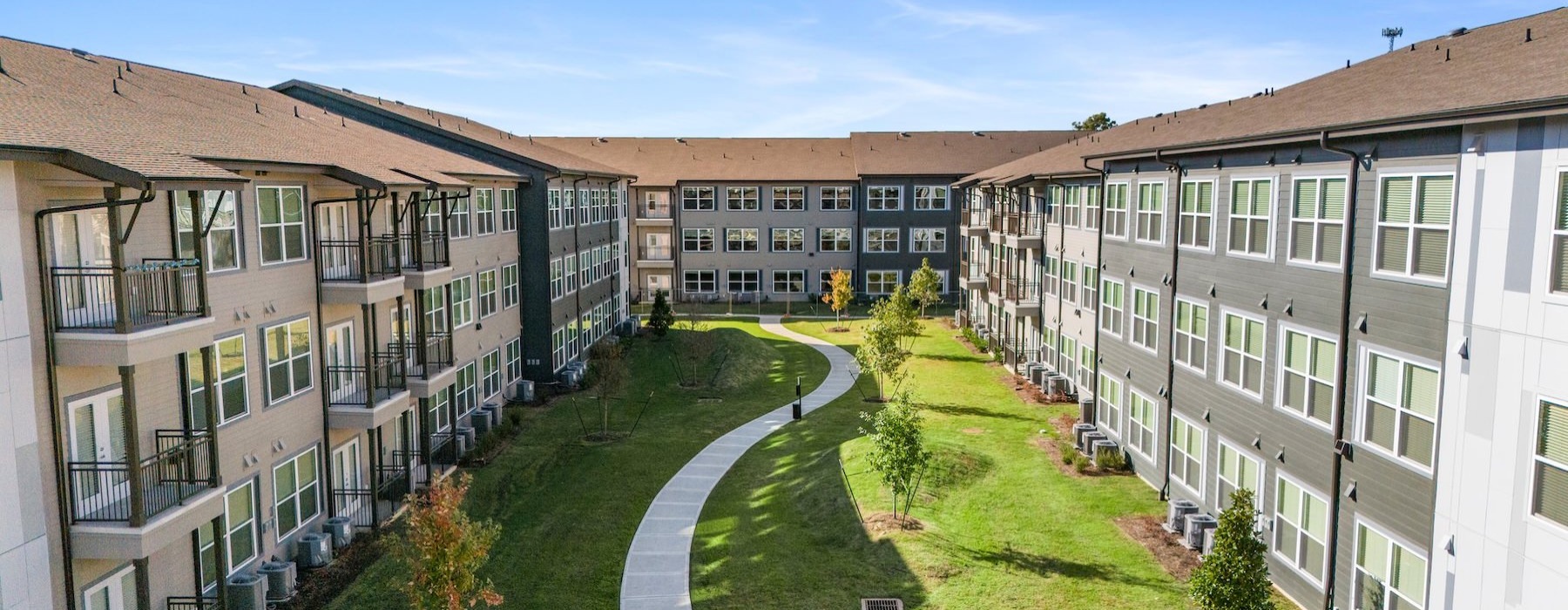 a courtyard with a walking path