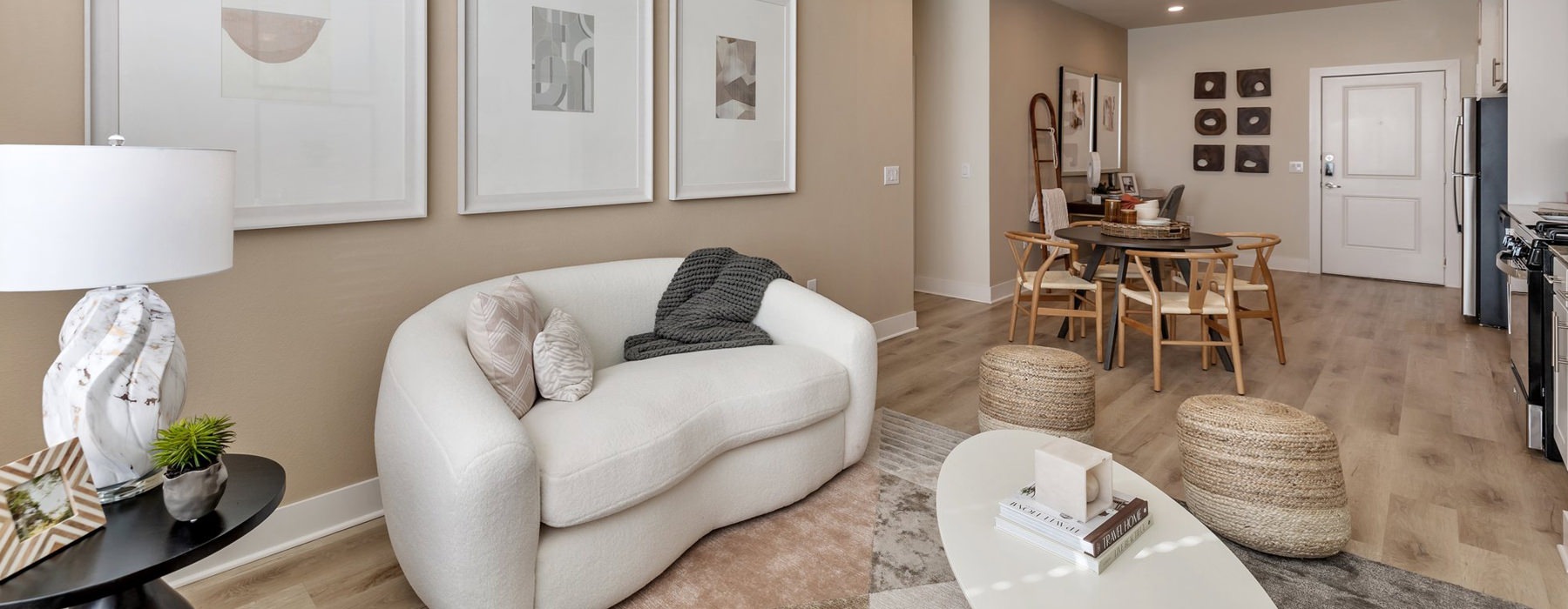 living room wity couch and dining table
